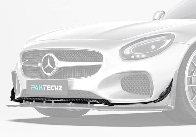 A dynamic front-end profile of the Mercedes-AMG GT showcasing the seamless integration of the carbon fiber front lip for aggressive styling and aerodynamics