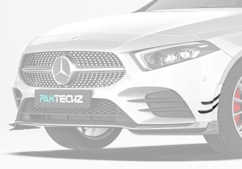 A high-quality front-side view of the Mercedes Benz A35 AMG, showcasing the bold and aggressive look of the Carbon Fiber Front Canards integrated with the bumper
