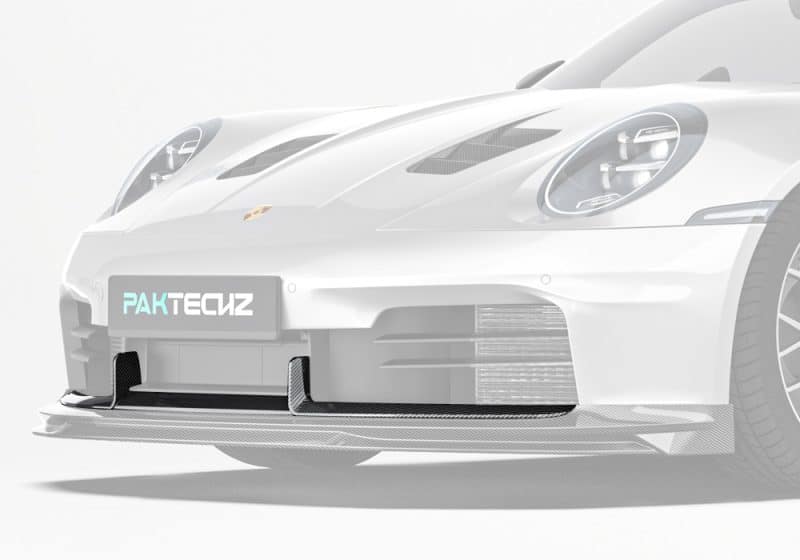 A stunning image showcasing the Carbon Fiber Front Vent Trim seamlessly integrated into the aggressive and sporty profile of the Porsche 911 992.2