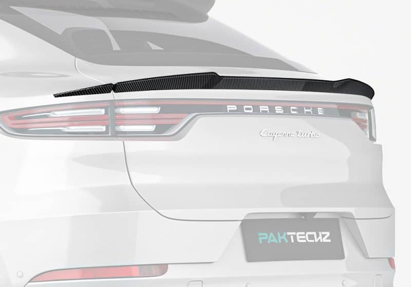 A dynamic rear shot showing the precise fitment of the Carbon Fiber Rear Spoiler, emphasizing aerodynamic refinement