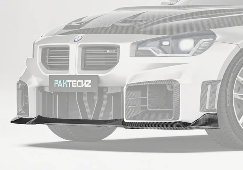 BMW M2 G87 equipped with the Carbon Fiber Front Lip, showcasing its aggressive styling and aerodynamic design seamlessly integrated with the factory bumper