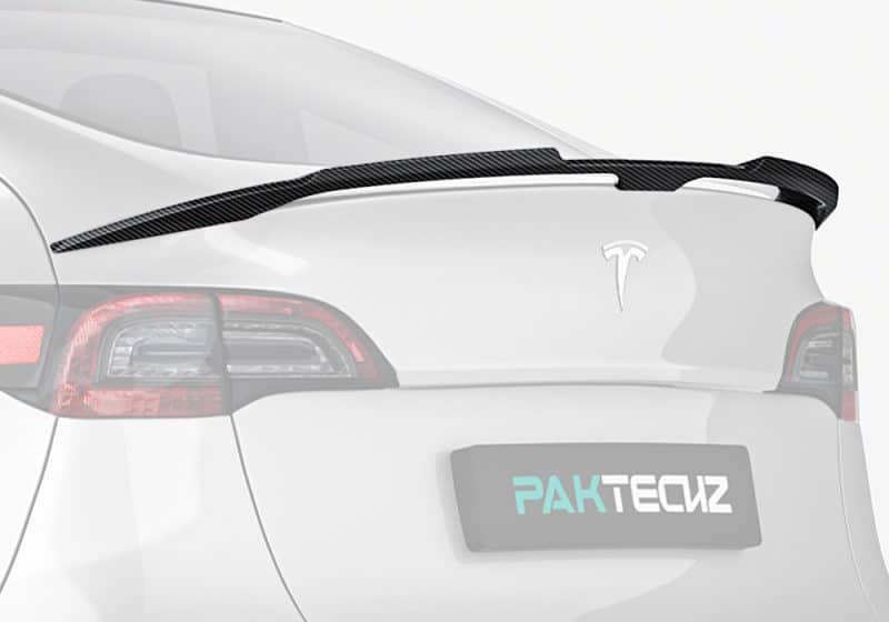 A close-up shot showcasing the aerospace-grade carbon fiber weave and reflective UV-resistant glossy finish