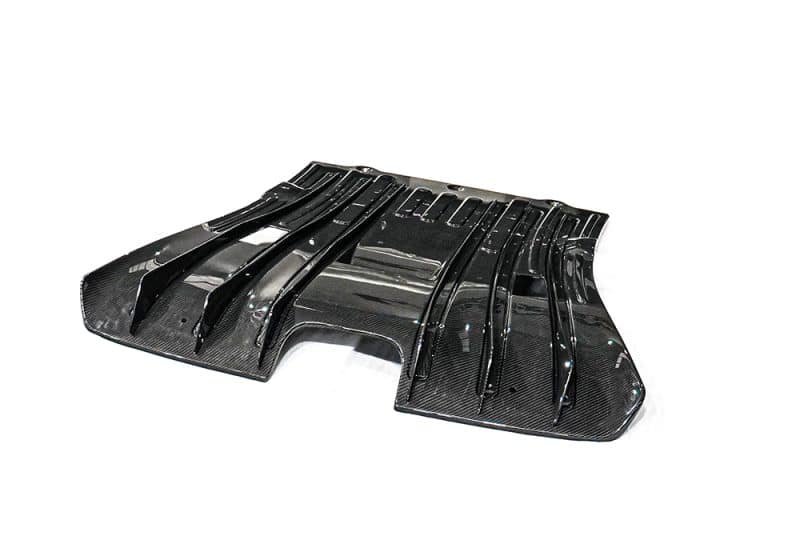 Undercarriage view of Porsche 992 GT3 RS showcasing the installed Carbon Fiber Bottom Panel for enhanced aerodynamics